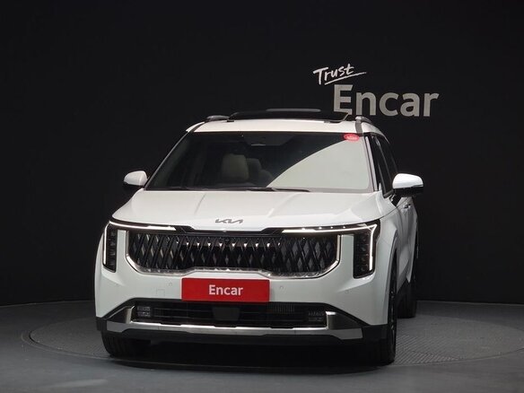 2024 Kia Carnival IV Рестайлинг, белый - вид 2