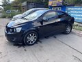 2012 Chevrolet Aveo II, чёрный, 660000 рублей - вид 5