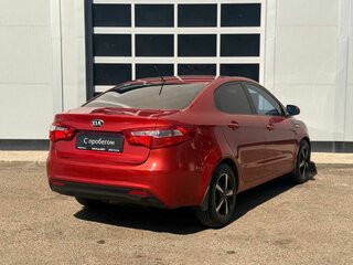 2013 Kia Rio 5-speed III, красный, 605000 рублей, вид 5
