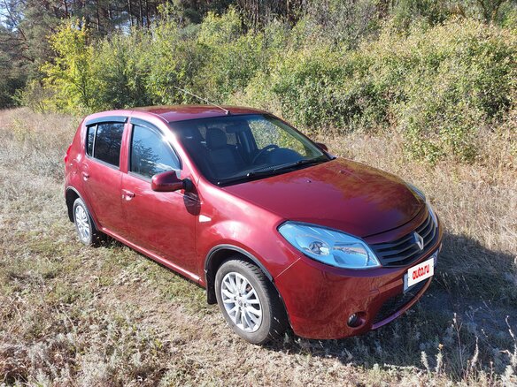 2011 Renault Sandero I, красный, 470000 рублей - вид 2