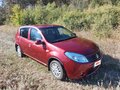 2011 Renault Sandero I, красный, 470000 рублей - вид 2