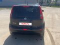 2008 Nissan Note I, чёрный, 525000 рублей - вид 4