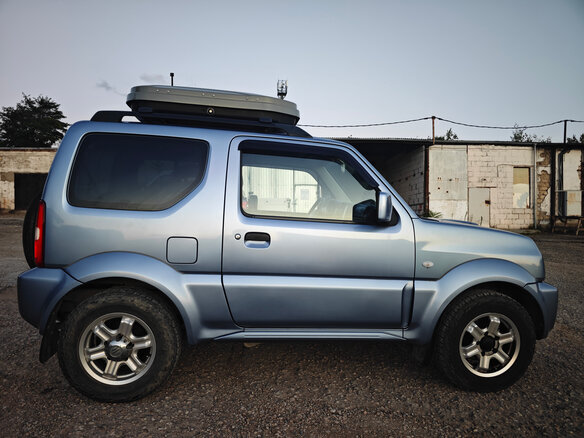 2012 Suzuki Jimny III Рестайлинг 2, голубой, 1450000 рублей - вид 4