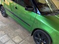 2011 Skoda Fabia II Рестайлинг, зелёный - вид 2