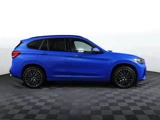 2019 BMW X1 20i xDrive II (F48) Рестайлинг, голубой, 3453000 рублей, вид 4