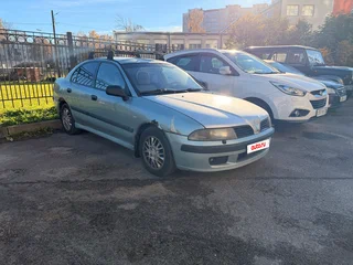 2002 Mitsubishi Carisma I Рестайлинг, серый, 150000 рублей, вид 3