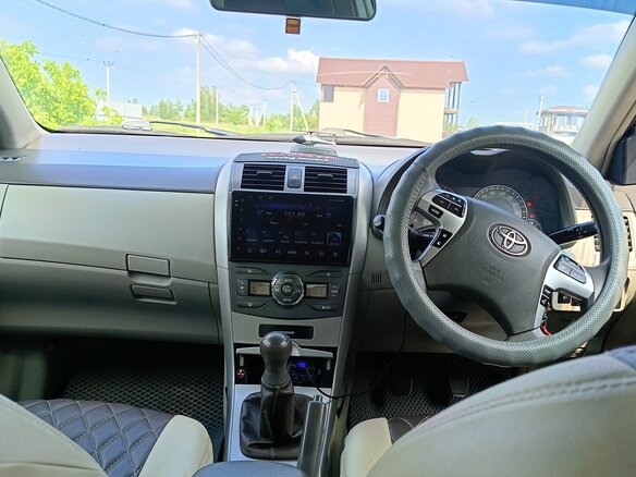2010 Toyota Corolla Axio X (E140, E150) Рестайлинг, серый, 800000 рублей - вид 9