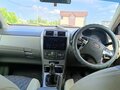 2010 Toyota Corolla Axio X (E140, E150) Рестайлинг, серый, 800000 рублей - вид 9