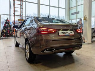 2026 Lada (ВАЗ) Vesta I Рестайлинг (NG), коричневый, 1835900 рублей, вид 2