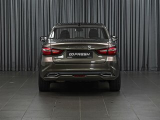 2024 Lada (ВАЗ) Vesta I Рестайлинг (NG), коричневый, 1385000 рублей, вид 4
