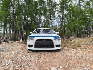 2011 Mitsubishi Lancer X Рестайлинг, белый, 640000 рублей, вид 1