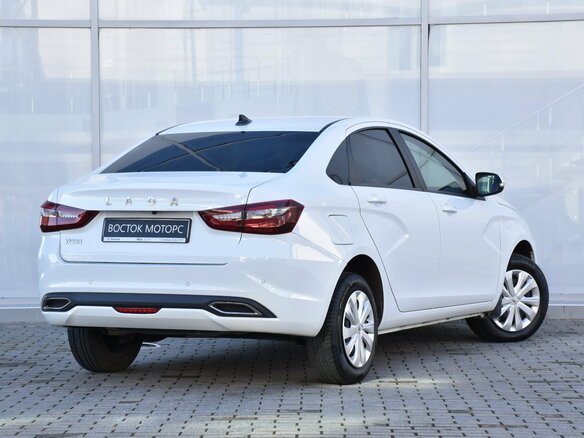 2023 Lada (ВАЗ) Vesta I Рестайлинг (NG), белый, 1180000 рублей - вид 1