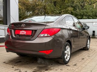 2016 Hyundai Solaris I Рестайлинг, коричневый, 579000 рублей, вид 3