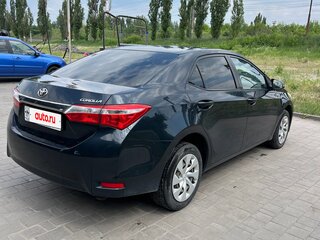 2014 Toyota Corolla XI (E160, E170, E180), серый, 900000 рублей, вид 3
