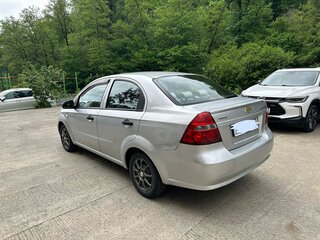 2010 Chevrolet Aveo I Рестайлинг, серебристый, 550000 рублей, вид 4