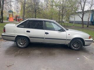 2005 Daewoo Nexia I, серебристый, 245000 рублей, вид 4