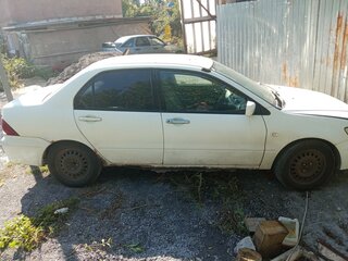 2002 Mitsubishi Lancer Cedia IX, белый, 130000 рублей, вид 4