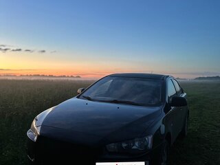 2010 Mitsubishi Lancer X, чёрный, 650000 рублей, вид 2