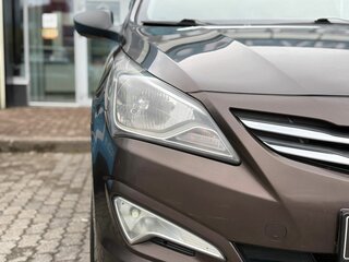 2015 Hyundai Solaris I Рестайлинг, коричневый, 985000 рублей, вид 4