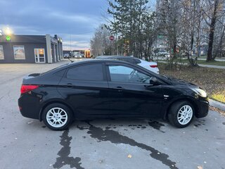 2014 Hyundai Solaris I, чёрный, 730000 рублей, вид 3