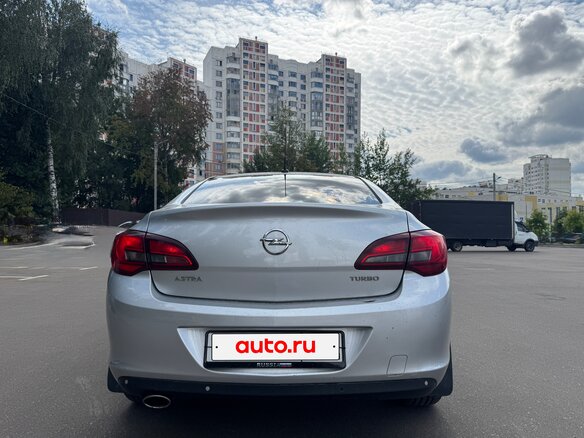 2013 Opel Astra J Рестайлинг, серебристый - вид 6
