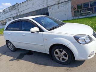 2011 Kia Rio II Рестайлинг, белый, 600000 рублей, вид 3