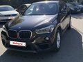 2017 BMW X1 20i xDrive II (F48), коричневый, 2750000 рублей - вид 1