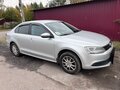 2014 Volkswagen Jetta VI, серебристый - вид 1