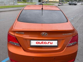 2014 Hyundai Solaris I Рестайлинг, оранжевый, 850000 рублей, вид 4