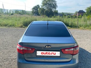 2014 Kia Rio 5-speed III, голубой, 650000 рублей, вид 4