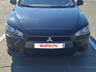 2010 Mitsubishi Lancer X, чёрный, 629000 рублей, вид 1
