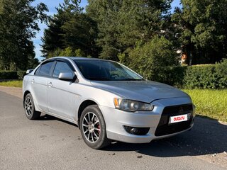 2009 Mitsubishi Lancer X, серебристый, 550000 рублей, вид 1