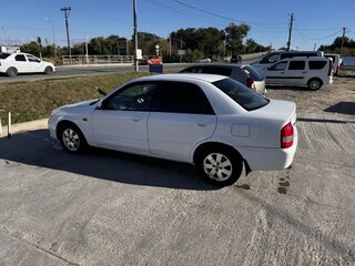 2001 Mazda Familia VIII (BJ), белый, 330000 рублей, вид 3