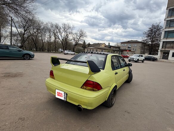 2001 Mitsubishi Lancer IX, жёлтый, 170000 рублей - вид 9