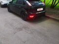 2010 Ford Focus II Рестайлинг, чёрный, 550000 рублей - вид 2