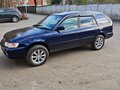 1999 Toyota Corolla VII (E100), синий - вид 2
