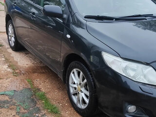 2010 Toyota Corolla X (E140, E150), чёрный, 595000 рублей, вид 5