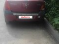 2009 Renault Logan I, красный, 550000 рублей - вид 1