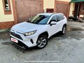 2019 Toyota RAV4 V (XA50), белый - вид 1