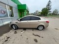 2012 Kia Rio 5-speed III, бежевый, 950000 рублей - вид 3