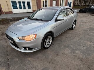 2011 Mitsubishi Lancer X Рестайлинг, серебристый, 600000 рублей, вид 2