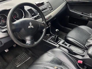2012 Mitsubishi Lancer X Рестайлинг, чёрный, 520000 рублей, вид 5