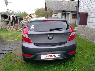 2013 Hyundai Solaris I, коричневый, 865000 рублей, вид 3
