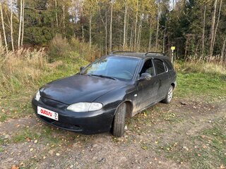 1997 Hyundai Lantra II, чёрный, 145000 рублей, вид 2