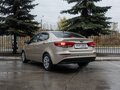 2015 Kia Rio III Рестайлинг, бежевый - вид 1