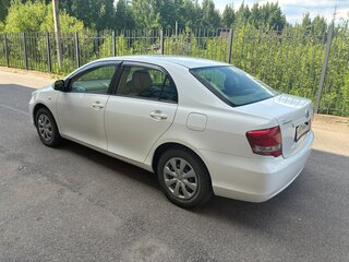 2010 Toyota Corolla Axio X (E140, E150) Рестайлинг, белый, 740000 рублей, вид 3