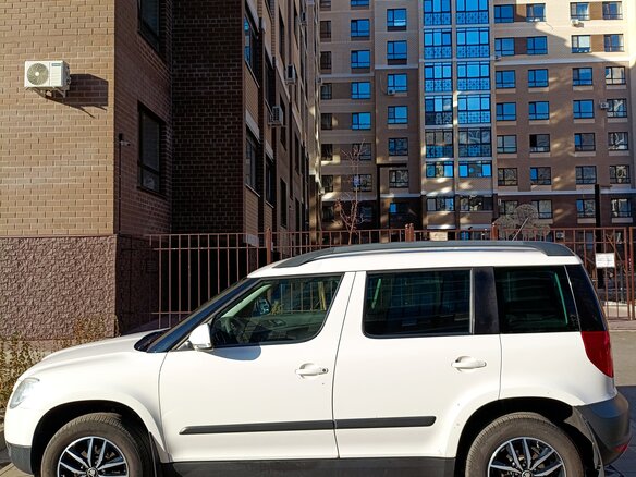 2012 Skoda Yeti I, белый, 901000 рублей - вид 4