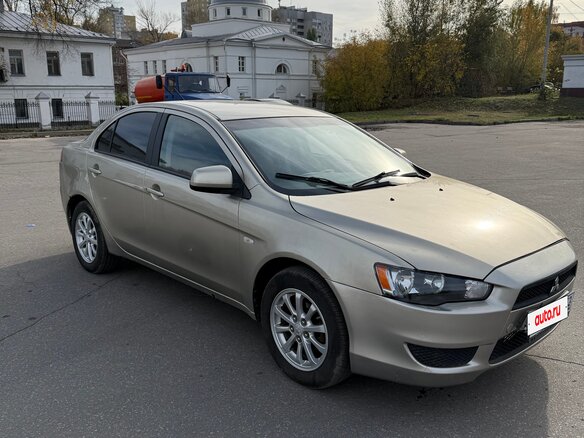2009 Mitsubishi Lancer X, бежевый, 395000 рублей - вид 2
