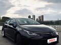 2019 Toyota Corolla XII (E210), коричневый, 1900000 рублей