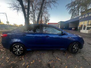 2012 Kia Rio 4-speed III, синий, 685000 рублей, вид 4